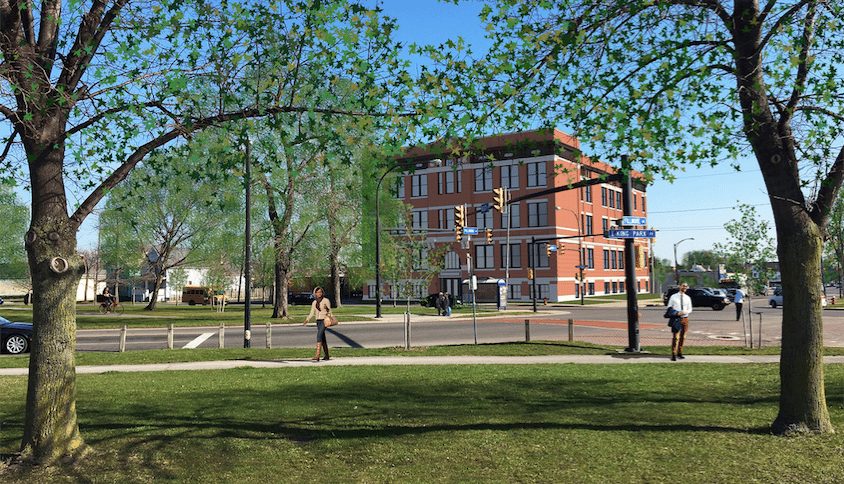 Parkview exterior — restored historic red-brick apartment building across from a tree-lined Buffalo park